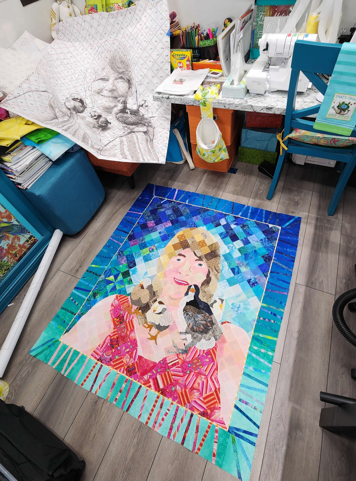 Full view of the quilt laid out on the floor